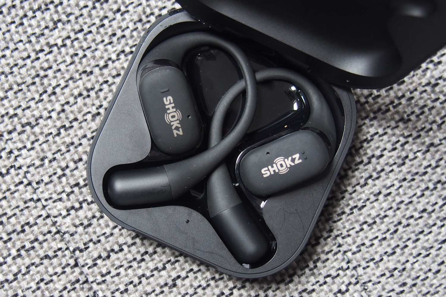 Shokz OpenFit buds in case